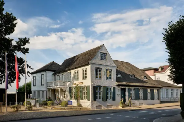 Louis C. Jacob im Sommer Weißes Haus mit grünen Fensterläden
